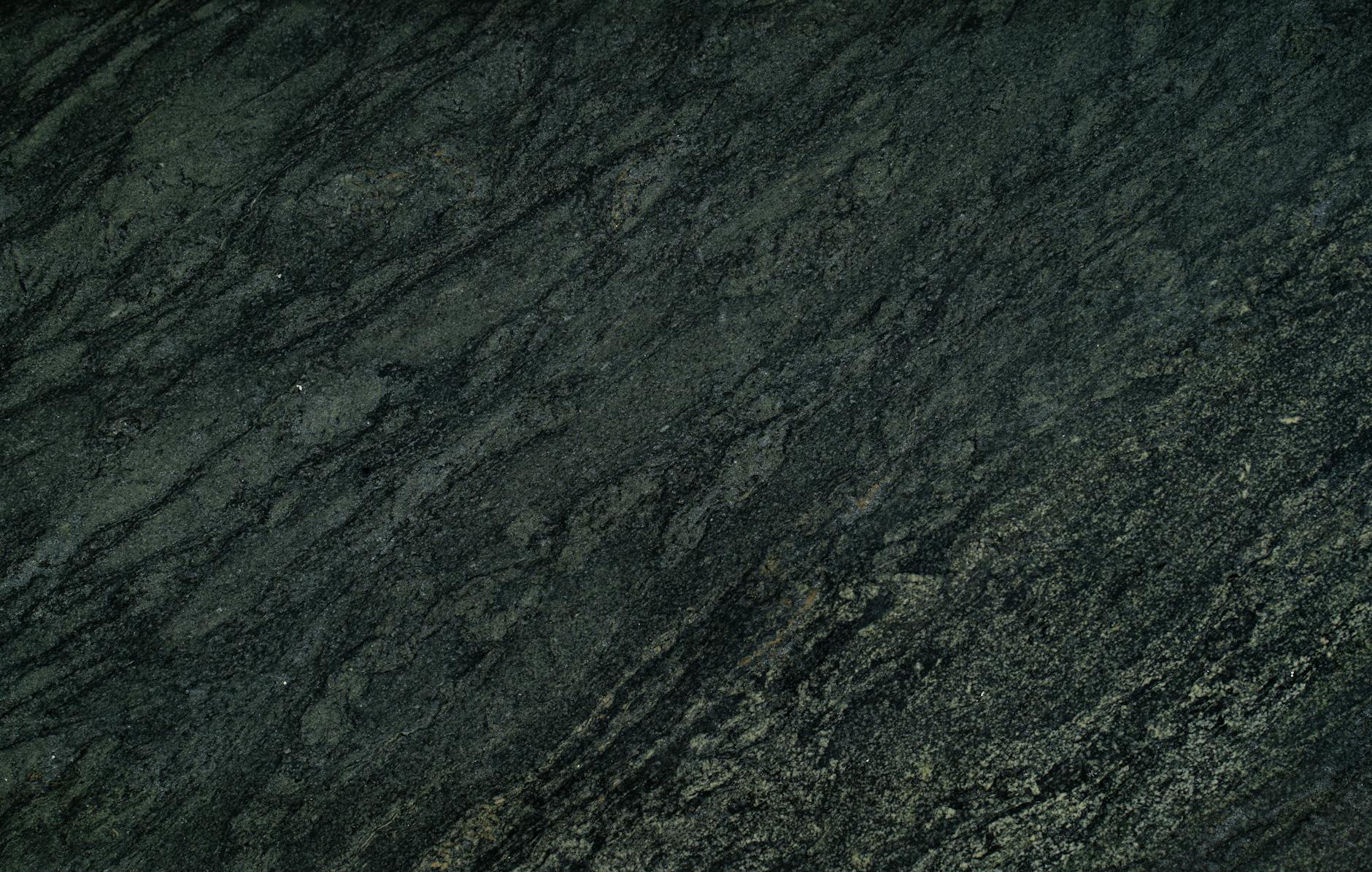 Black G15 Granite is a striking natural stone from South India, also known as Bengal Black. It features a deep black base with subtle flecks of lighter grey or silver tones, exuding sophistication and elegance.