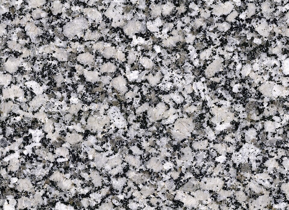 P White Granite, also known as Platinum White, is a natural light-colored granite stone quarried in Rajasthan, India. It has a classic 'salt-and-pepper' texture and is prized for its durability and affordability.